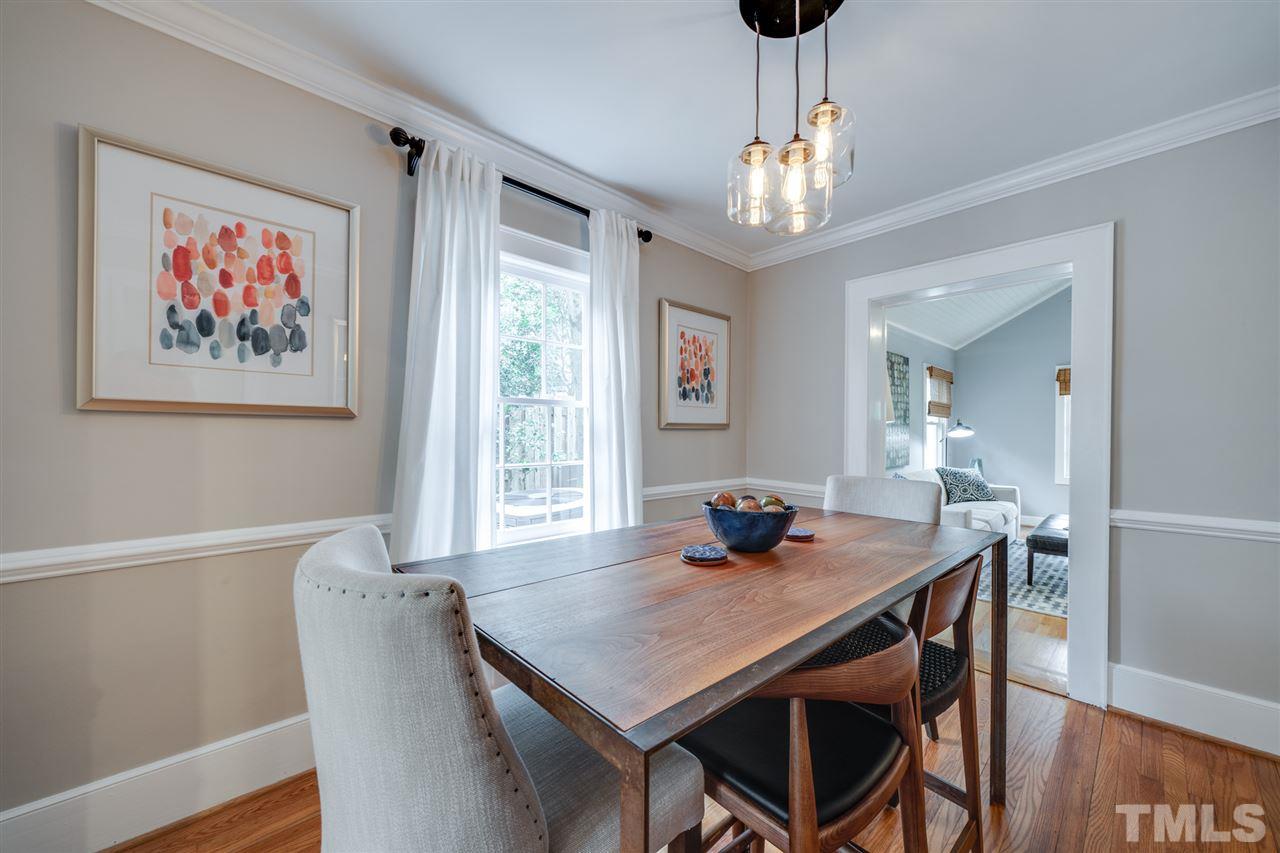 2607 Van Dyke Avenue Raleigh, NC 27607 - Photo 22 of 26 a view of a dining room with furniture window and wooden floor