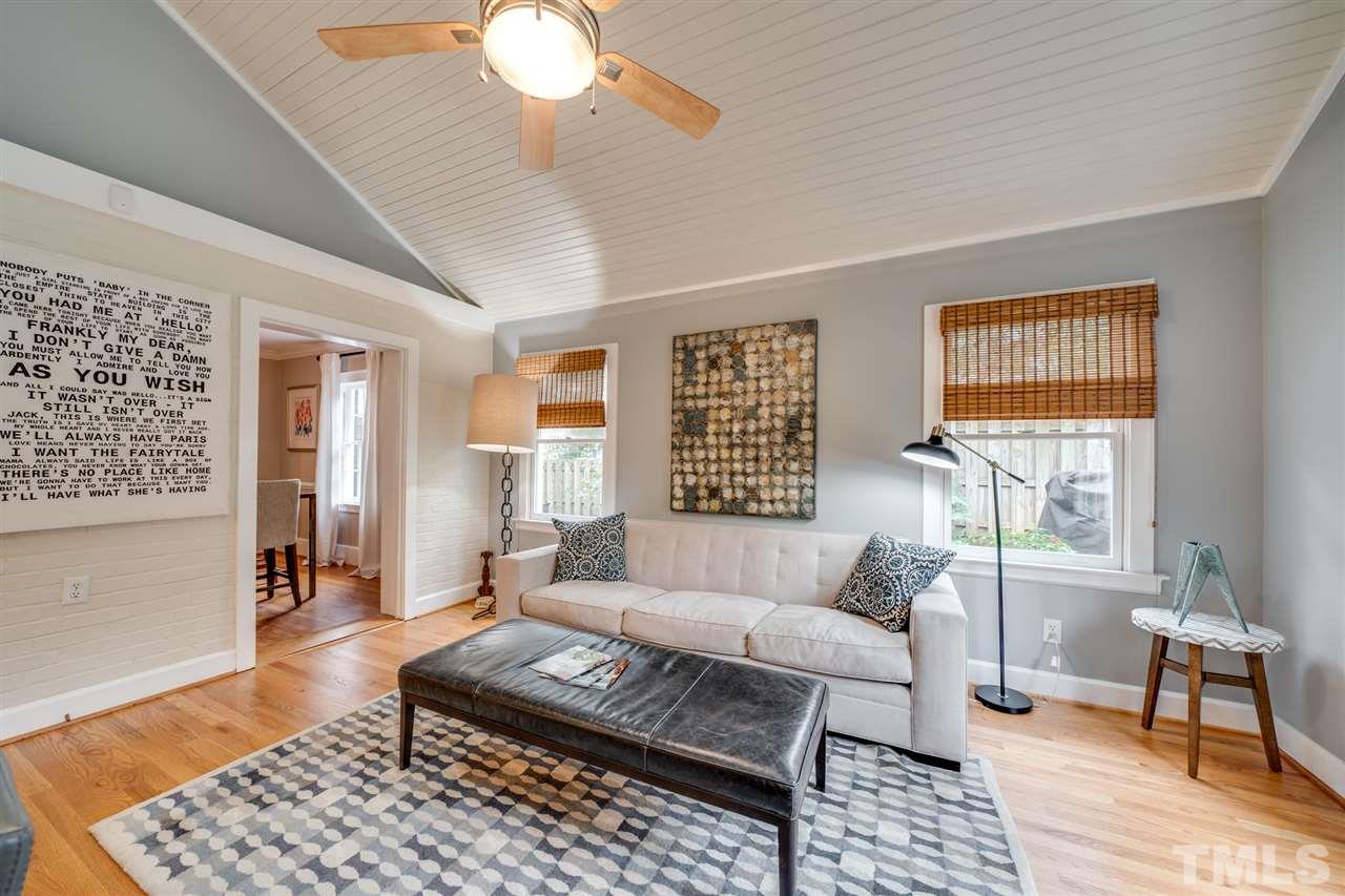 2607 Van Dyke Avenue Raleigh, NC 27607 - Photo 7 of 26 a living room with furniture and a window