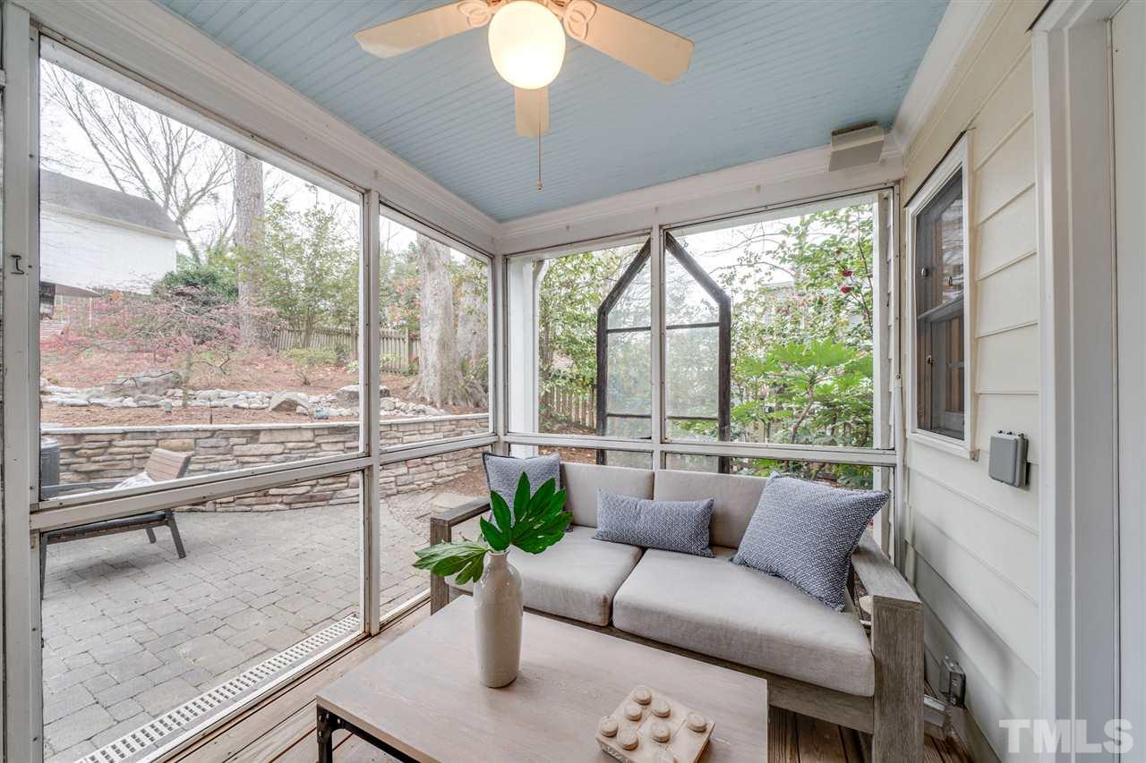 2607 Van Dyke Avenue Raleigh, NC 27607 - Photo 10 of 26 a living room with furniture potted plant and a large window