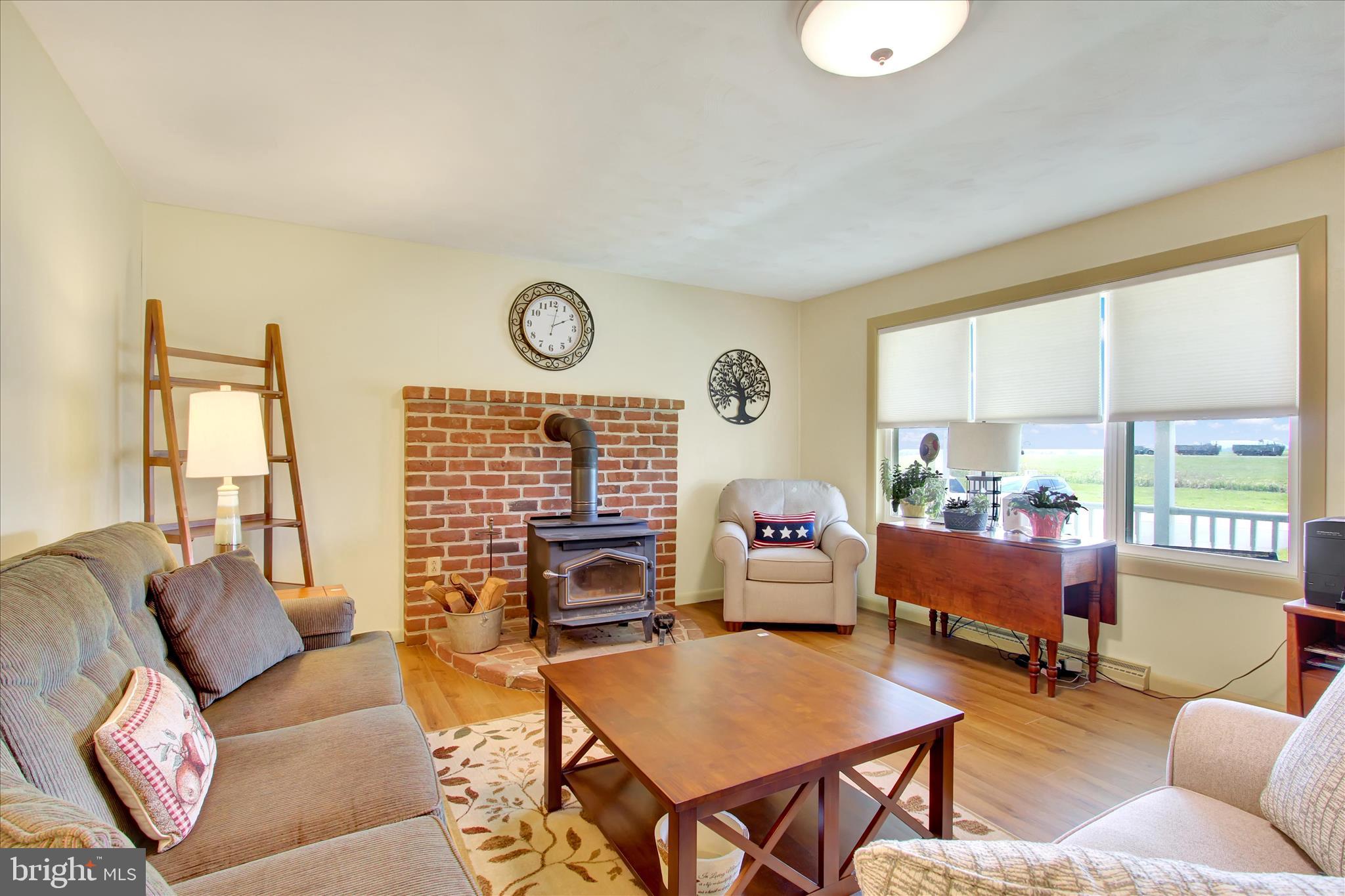 2275 Mummasburg Road Gettysburg, PA 17325 - Photo 5 of 31 a living room with furniture and a large window