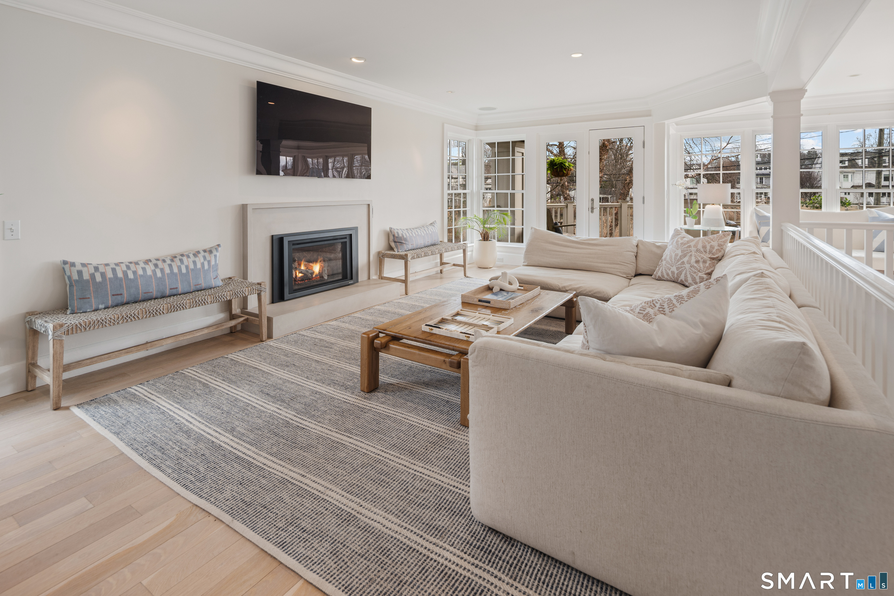 50 Roton Avenue Norwalk, CT 06853 - Photo 10 of 32 Living room with custom cement fireplace surround