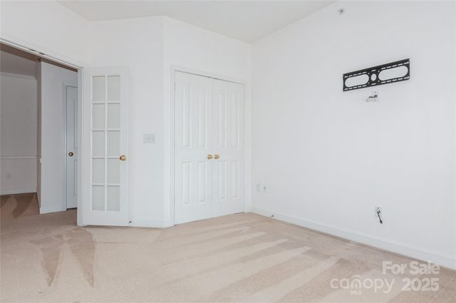 a view of a storage & utility room with a sink