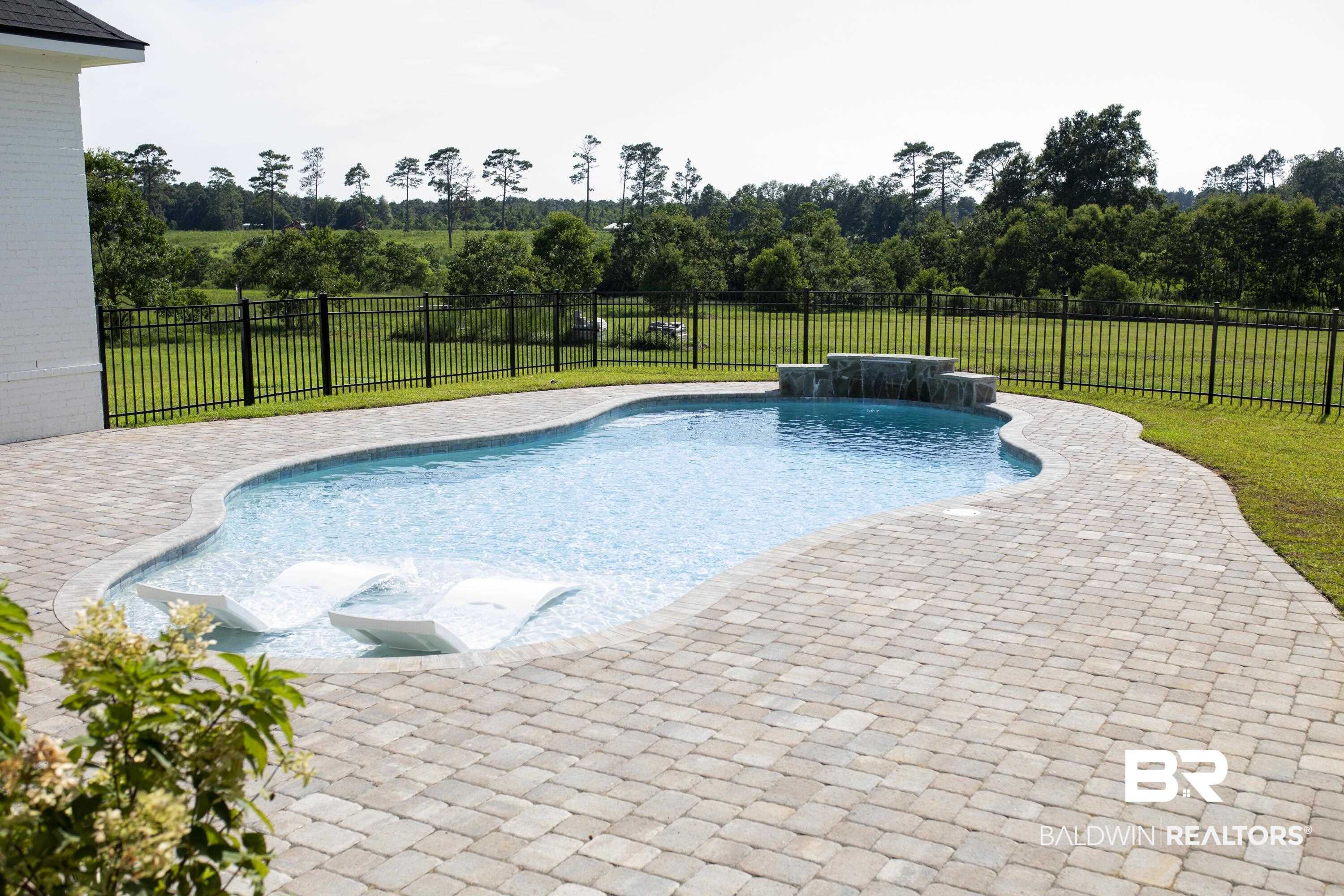 21767 Gallery Boulevard Fairhope, AL 36532 - Photo 70 of 74 View of swimming pool with a patio area and a fenced backyard