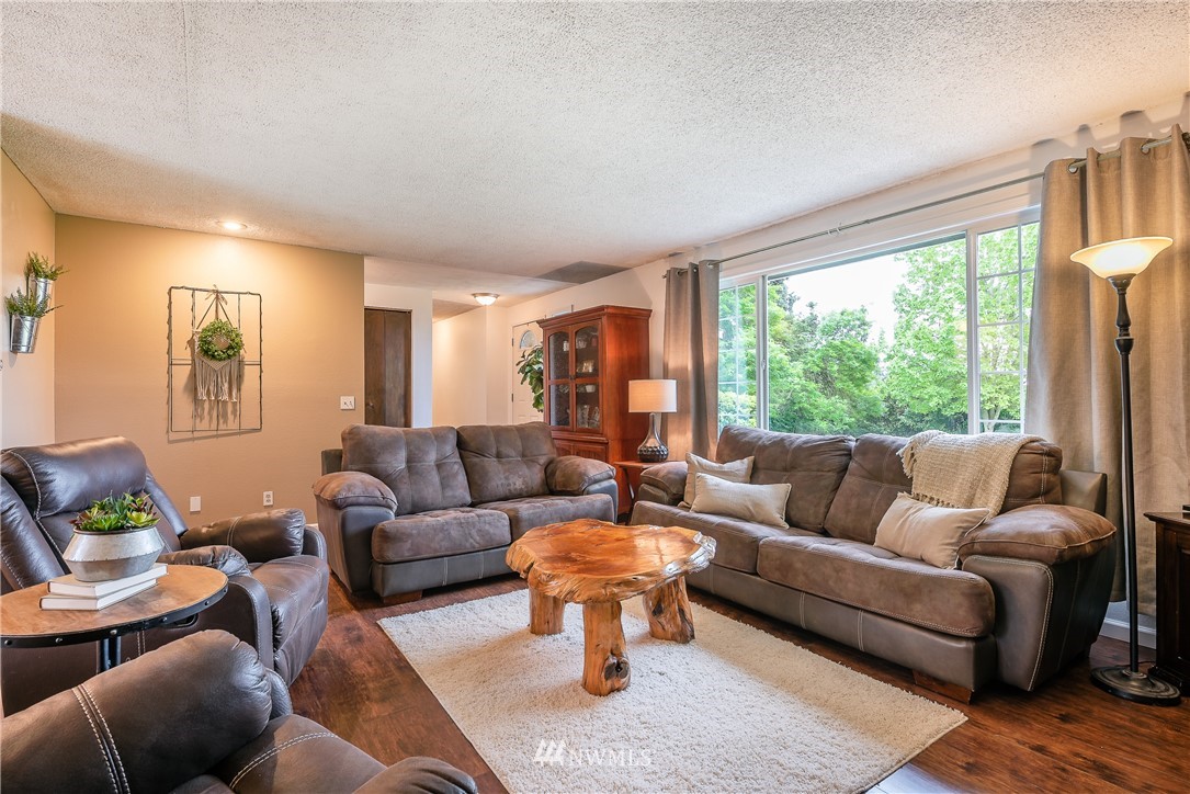 6820 Goodwin Road Everson, WA 98247 - Photo 3 of 34 a living room with furniture and a large window