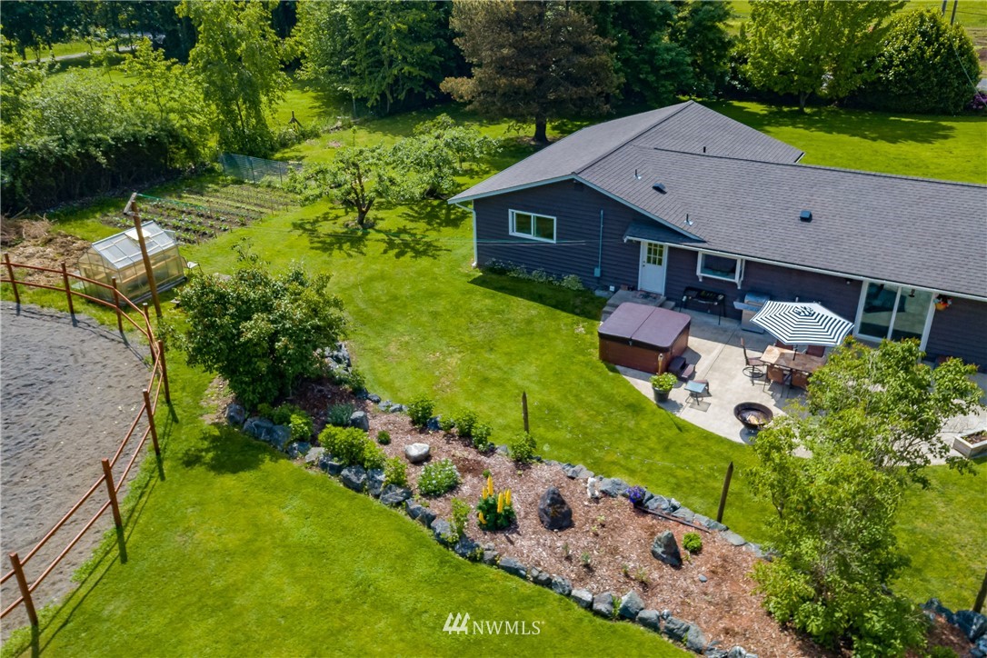 6820 Goodwin Road Everson, WA 98247 - Photo 23 of 34 a aerial view of a house with garden space and street view