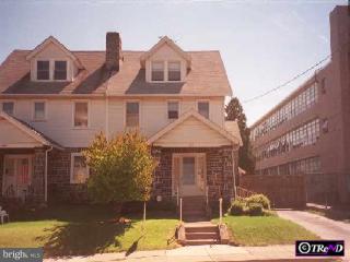 111 North Manoa Road Havertown, PA 19083 - Photo 1 of 1 a front view of a house with garden