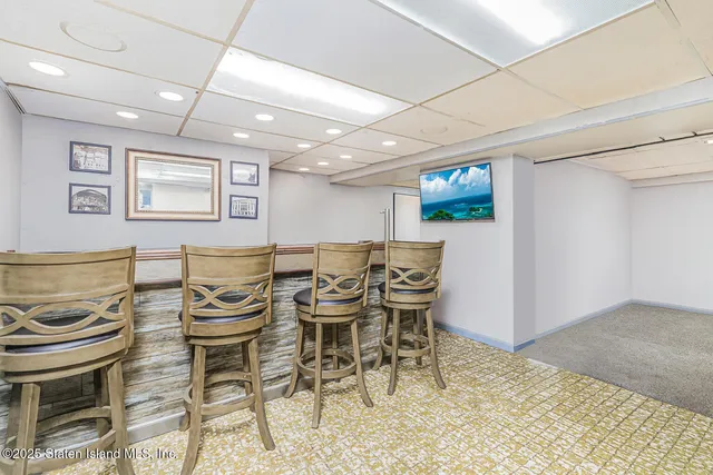 a kitchen with a dining table and chairs