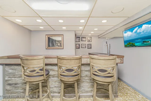 a living room with furniture and window