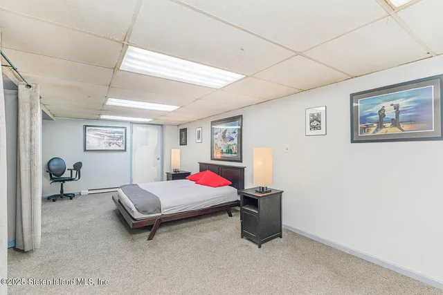 a room with furniture and a flat screen tv