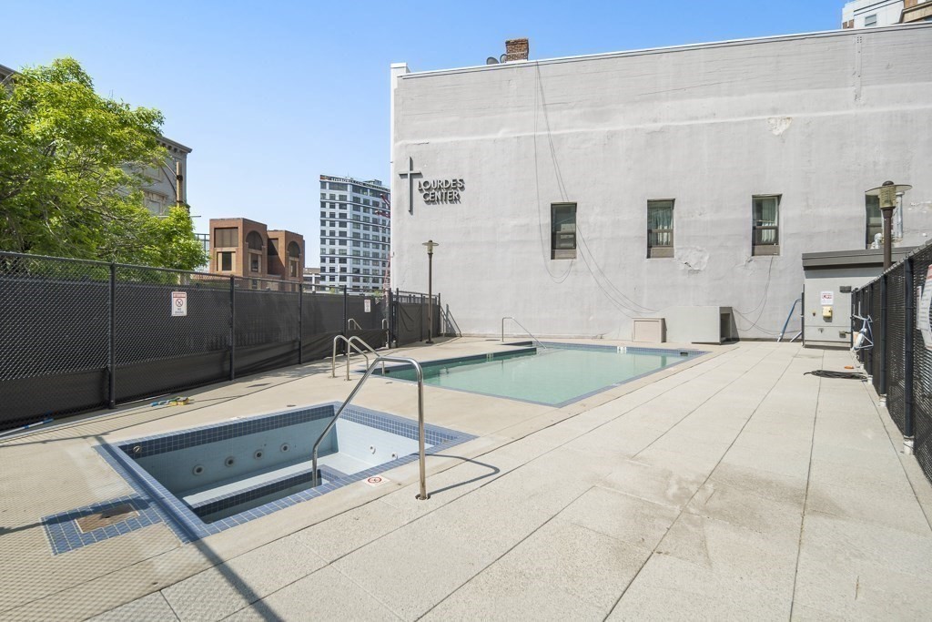 566 Commonwealth Avenue, Unit 706 Boston, MA 02215 - Photo 7 of 9 a building outdoor space with seating area and trees