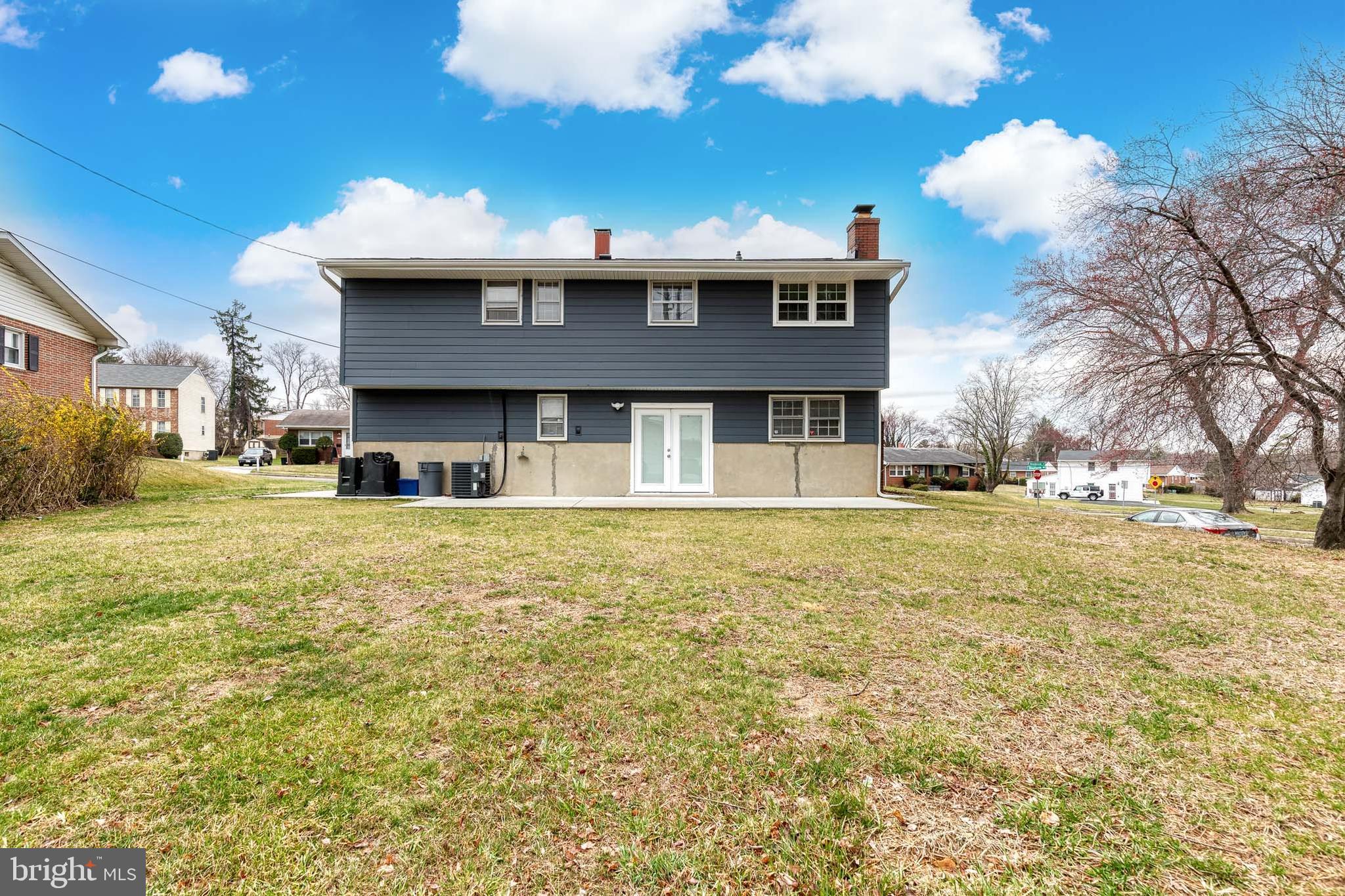 3719 Brenbrook Drive Randallstown, MD 21133 - Photo 23 of 24 a front view of a house with a yard
