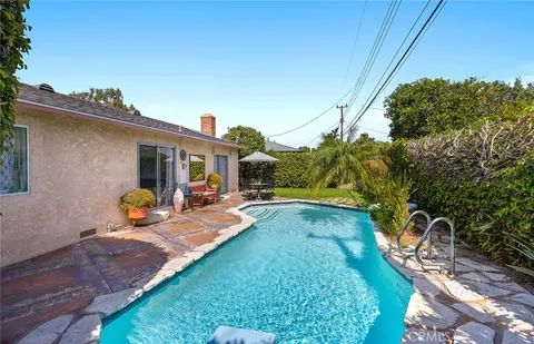 a view of a backyard with plants