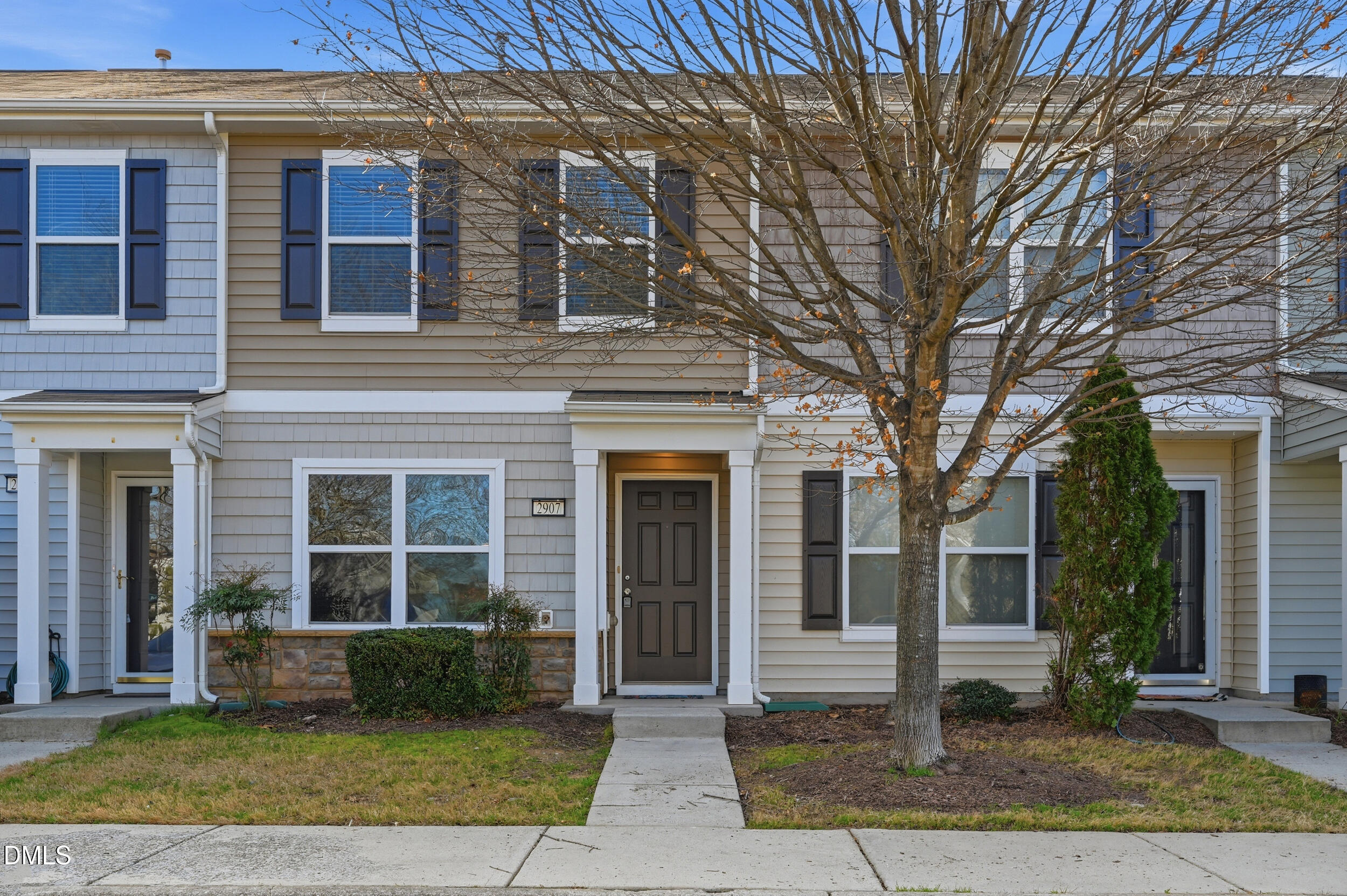 2907 Berkeley Springs Place Raleigh, NC 27616 - Photo 1 of 34 a front view of a house with a yard
