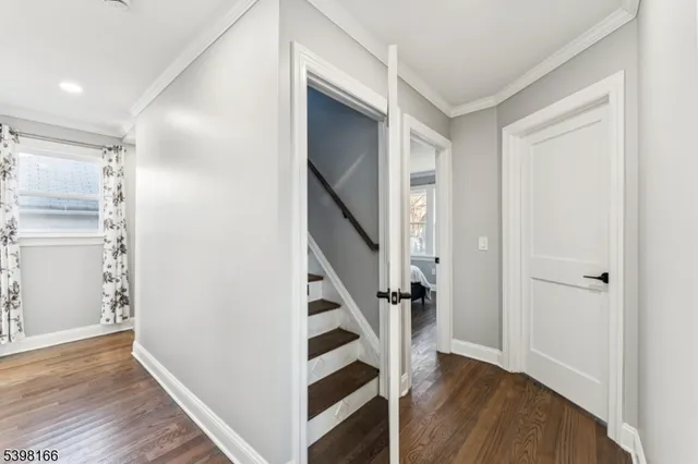 a view of a room with a flat screen tv