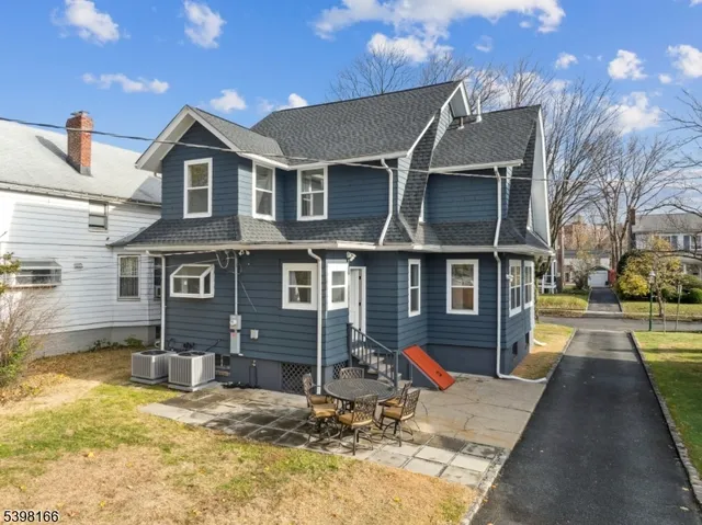 a view of a house with a swimming pool