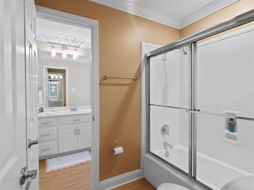 1103 Marigold Lane Longview, TX 75604 - Photo 27 of 34 a bathroom with a shower and a sink