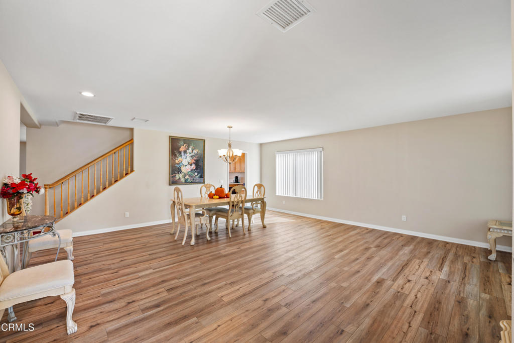 32650 The Old Road Castaic, CA 91384 - Photo 5 of 31 a dining room with furniture and wooden floor