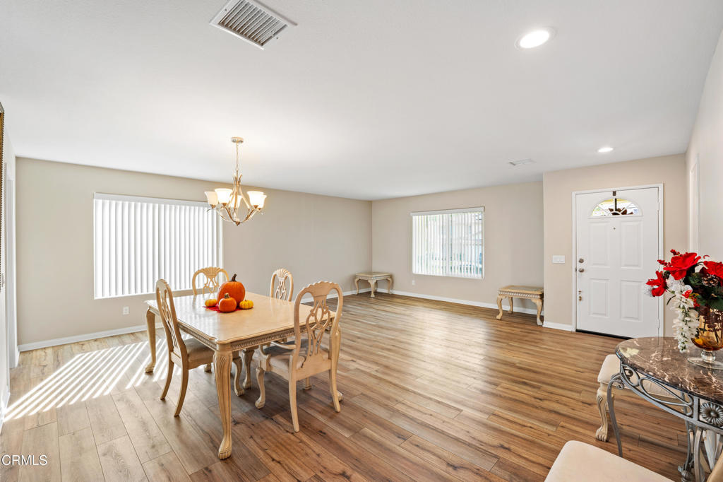 32650 The Old Road Castaic, CA 91384 - Photo 6 of 31 a view of a dining room with furniture and wooden floor