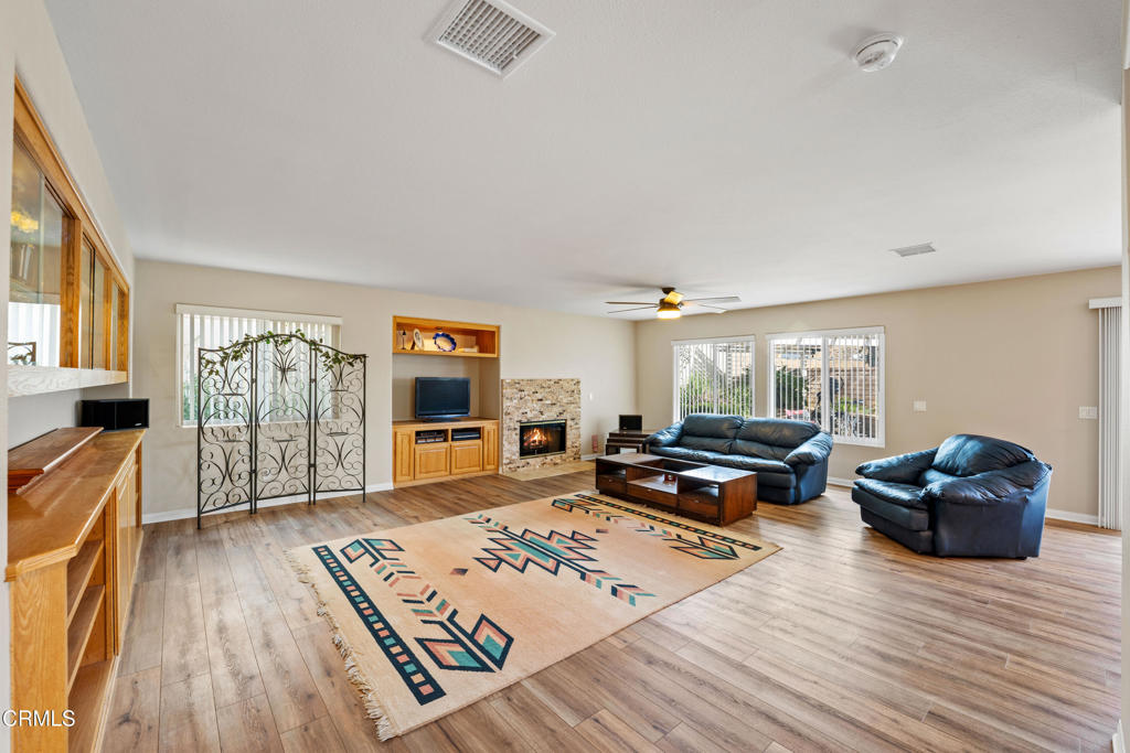 32650 The Old Road Castaic, CA 91384 - Photo 9 of 31 a living room with furniture and wooden floor
