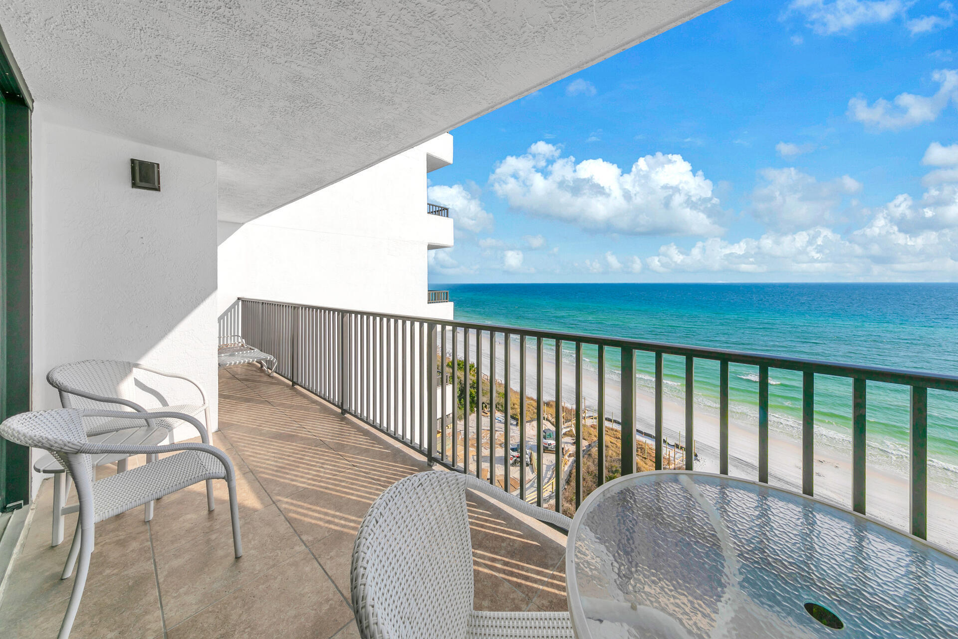 4100 East County Highway 30A, Unit 803 Santa Rosa Beach, FL 32459 - Photo 12 of 34 a balcony with table and chairs