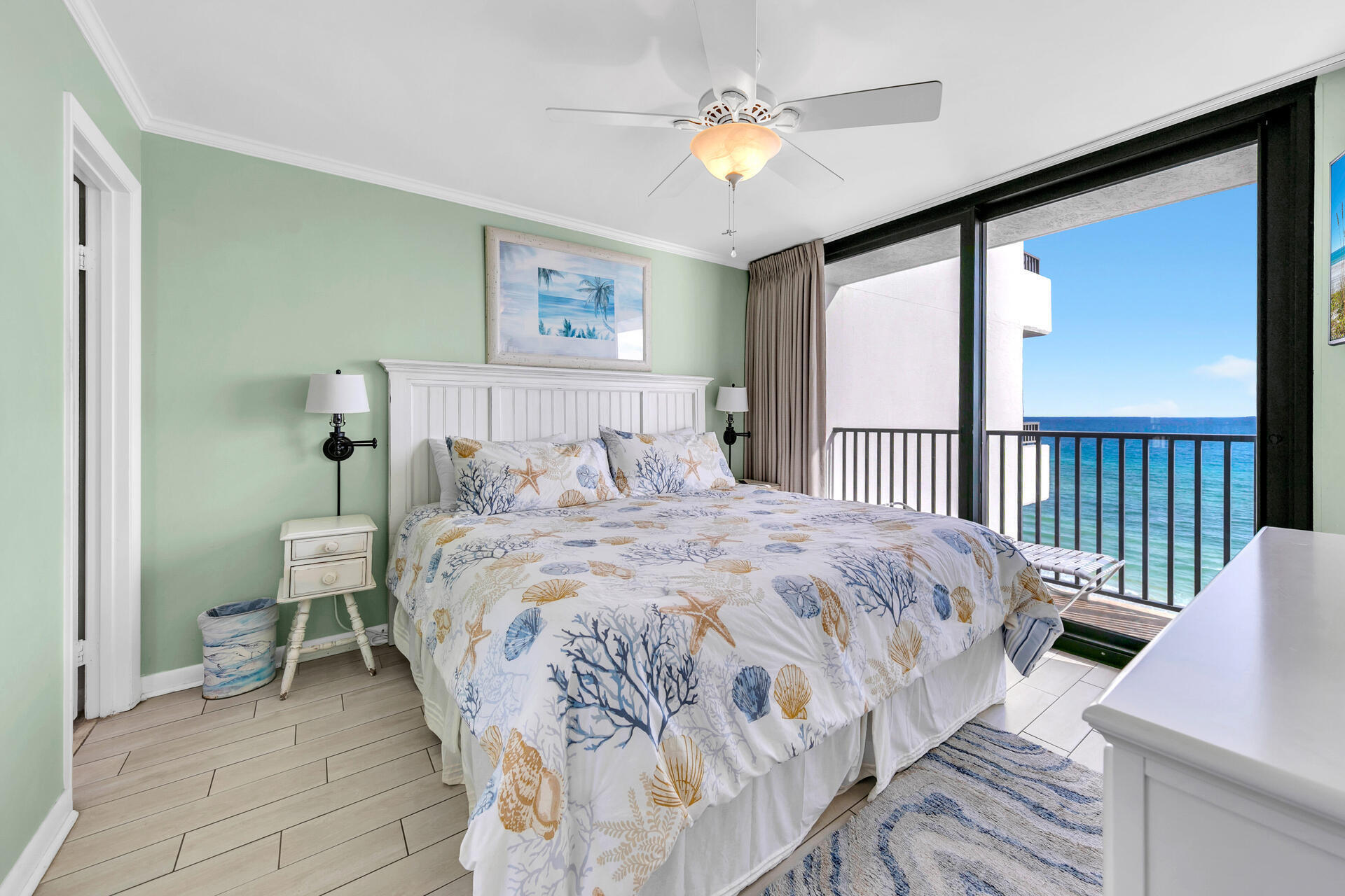 4100 East County Highway 30A, Unit 803 Santa Rosa Beach, FL 32459 - Photo 15 of 34 a bedroom with a bed and a chandelier