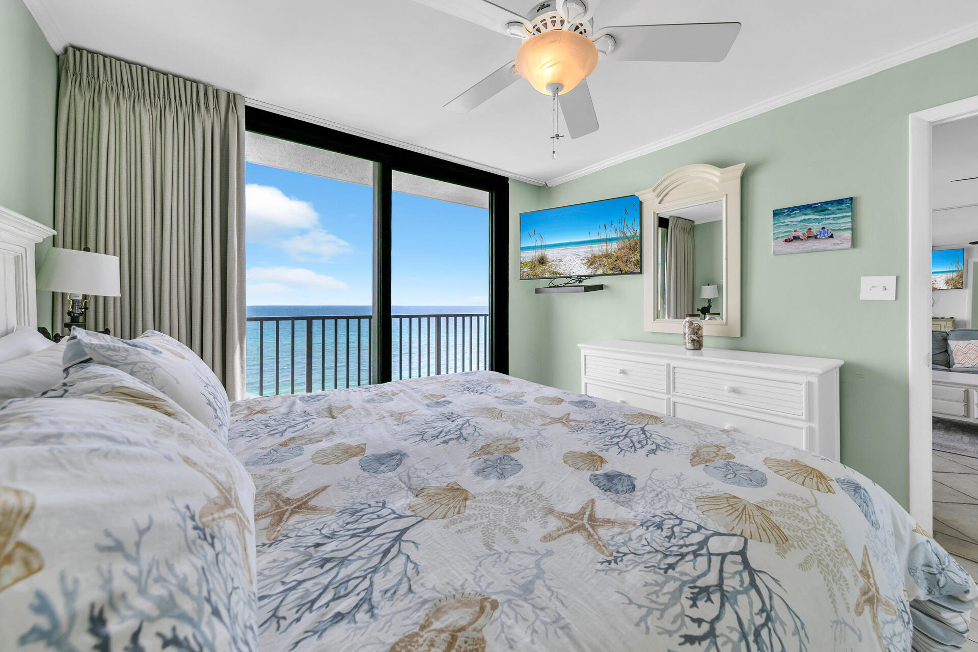 4100 East County Highway 30A, Unit 803 Santa Rosa Beach, FL 32459 - Photo 16 of 34 a bedroom with a large bed and a large window