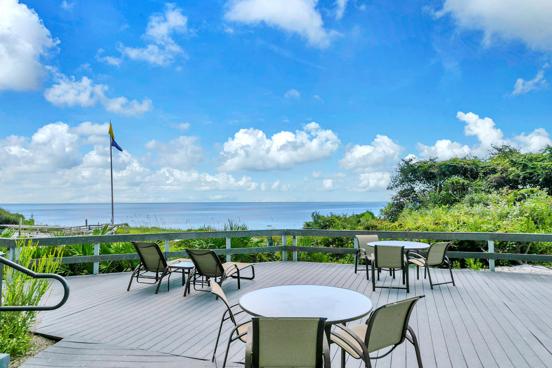 4100 East County Highway 30A, Unit 803 Santa Rosa Beach, FL 32459 - Photo 31 of 34 a view of a table and chairs in patio