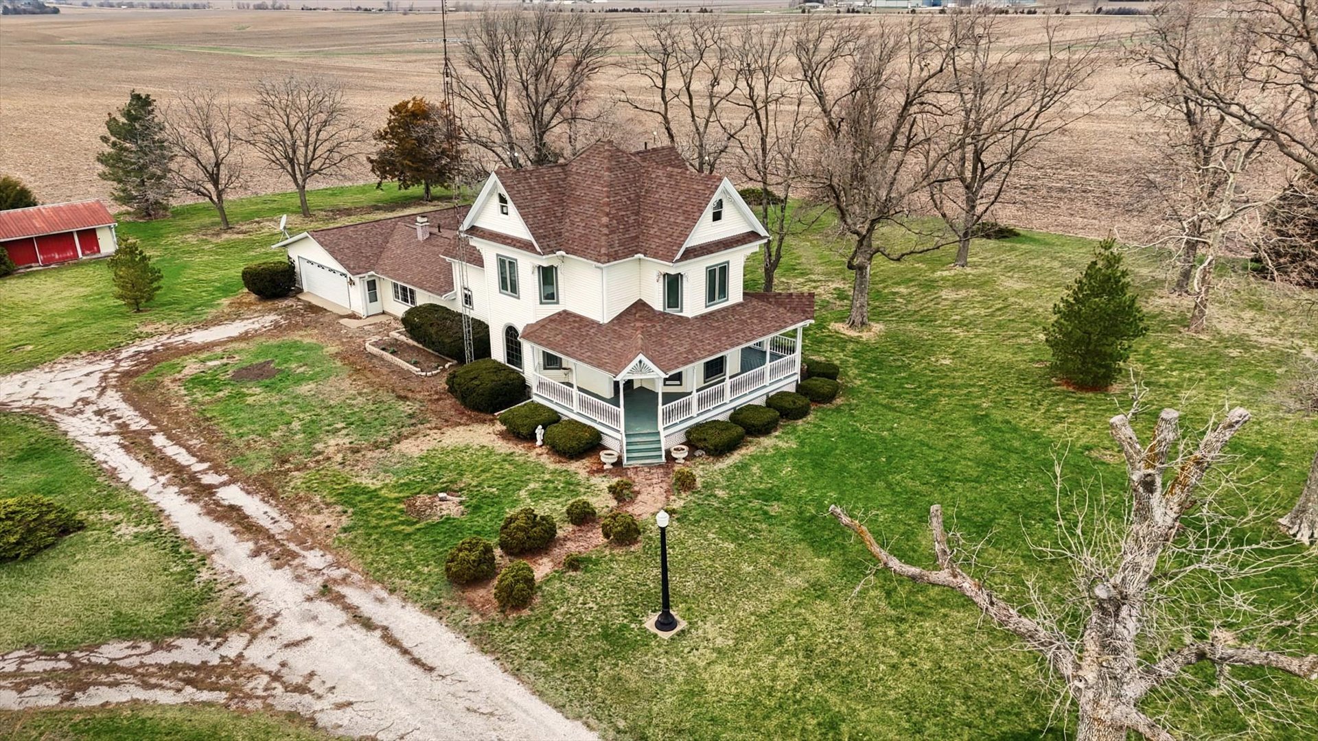 7961 North 3000 E Road Forrest, IL 61741 - Photo 4 of 66 a house view with a garden space