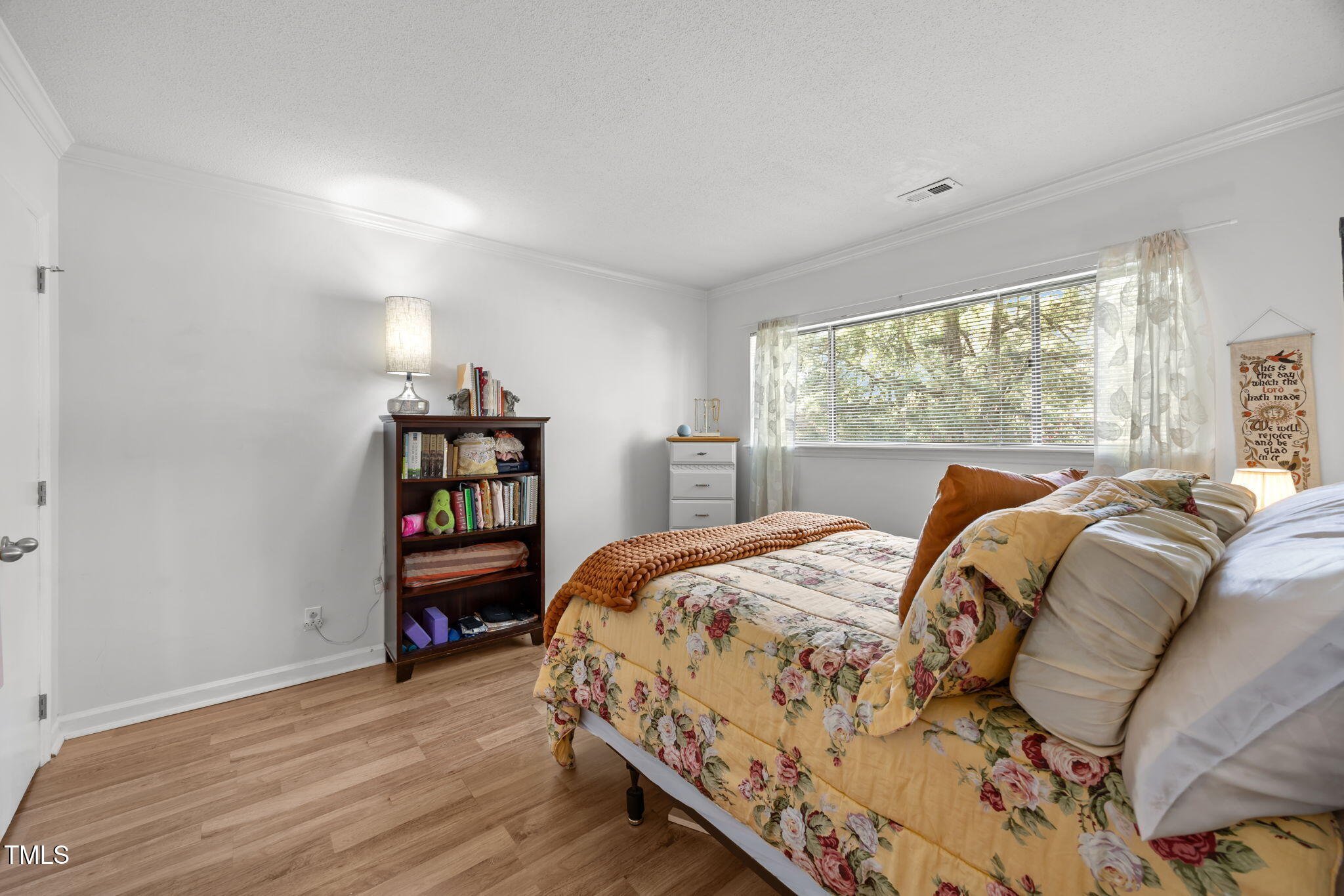 5024 Flint Ridge Place Raleigh, NC 27609 - Photo 27 of 46 a bedroom with a bed furniture and a large window