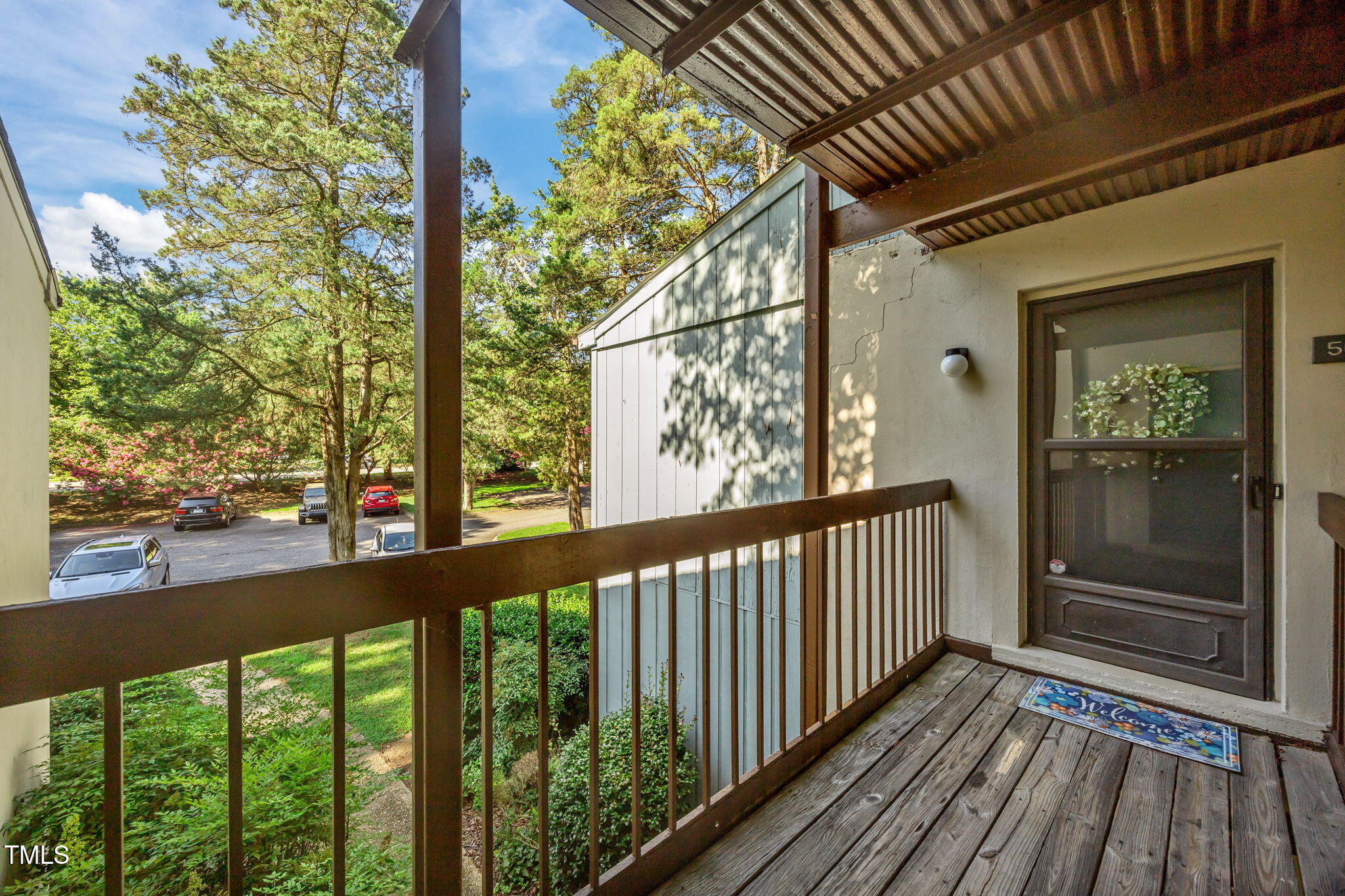 5024 Flint Ridge Place Raleigh, NC 27609 - Photo 3 of 46 a view of porch with wooden floor