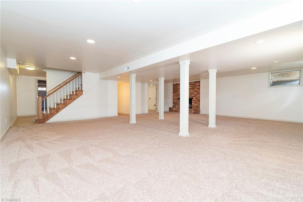 8151 Center Grove Church Road Clemmons, NC 27012 - Photo 24 of 30 Finished basement with new carpet and fresh paint