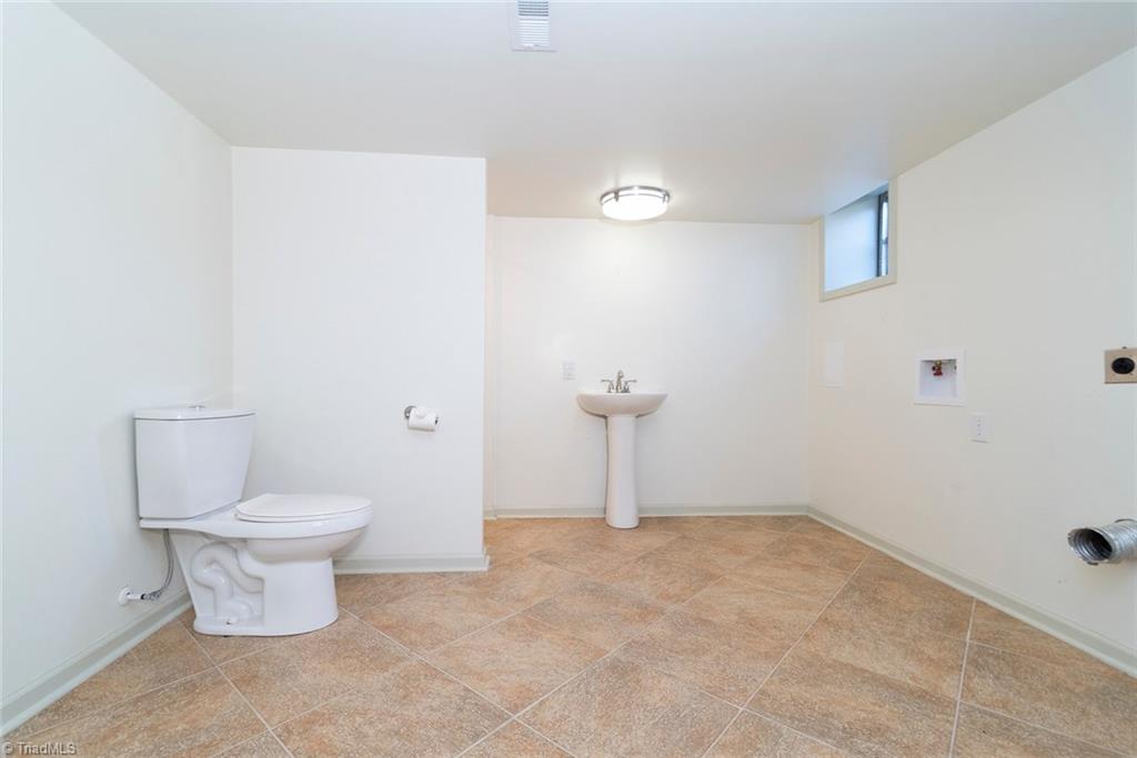 8151 Center Grove Church Road Clemmons, NC 27012 - Photo 27 of 30 Basement Laundry room with 3 piece bath.