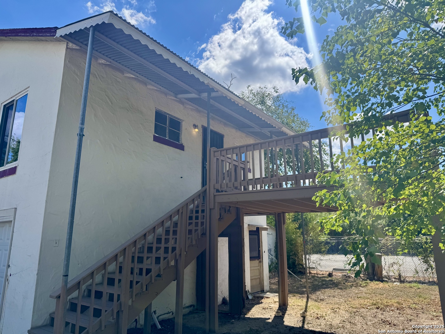 108 Robert E Lee, Unit 2 San Antonio, TX 78214 - Photo 1 of 8 a view of a porch with furniture and garden