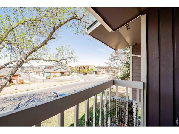 a view of empty room with wooden walls