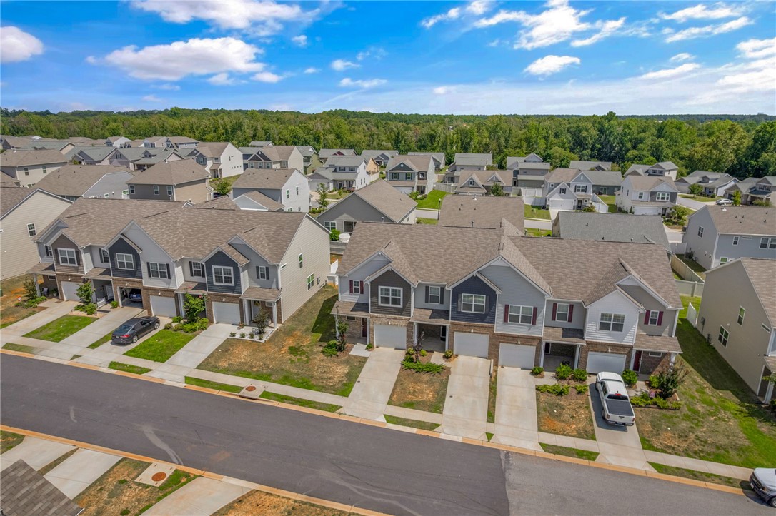 432 Bee Cv Way Pendleton, SC 29670 - Photo 33 of 39 These charming townhomes feature attached garages and welcoming front entrances.