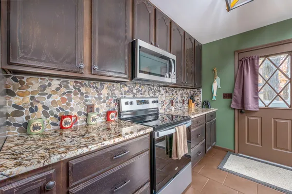 $599,900 | 10443 Midshore Drive, Unit 62, Mecosta, MI 49332