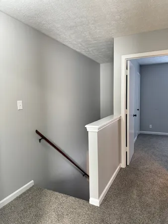 an entryway and hallway in a room