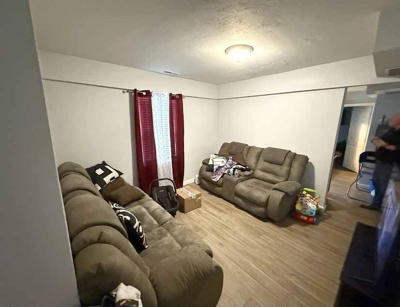 8 Cherry Street Lowell, MA 01852 - Photo 10 of 17 a living room with furniture