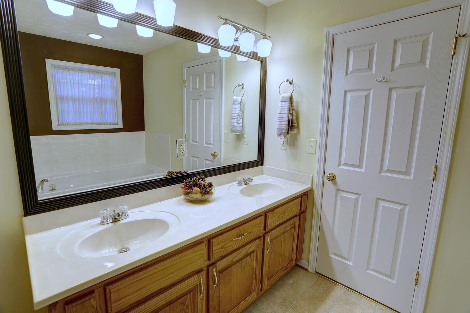 105 Lear Road Portland, TN 37148 - Photo 11 of 25 a bathroom with a sink and a mirror