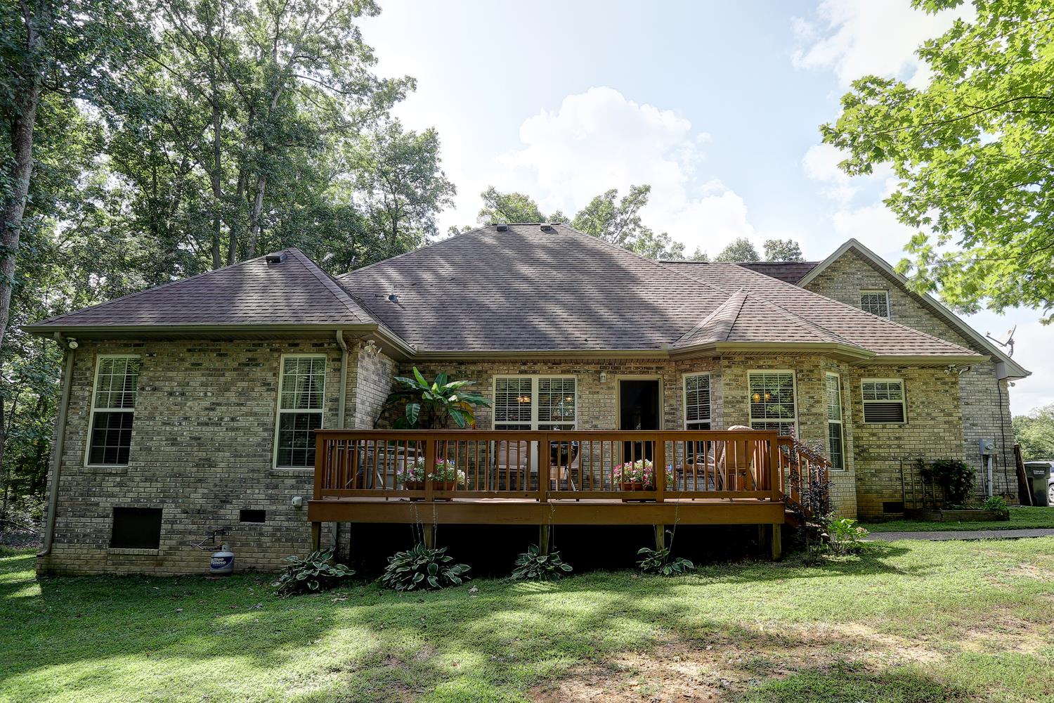 105 Lear Road Portland, TN 37148 - Photo 21 of 25 a front view of a house with a garden