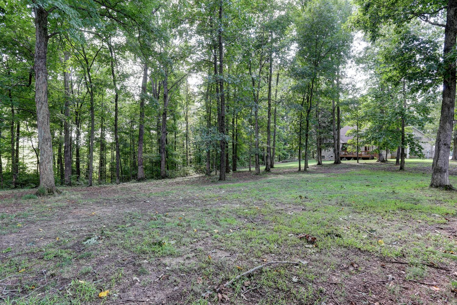 105 Lear Road Portland, TN 37148 - Photo 22 of 25 a view of outdoor space with trees all around