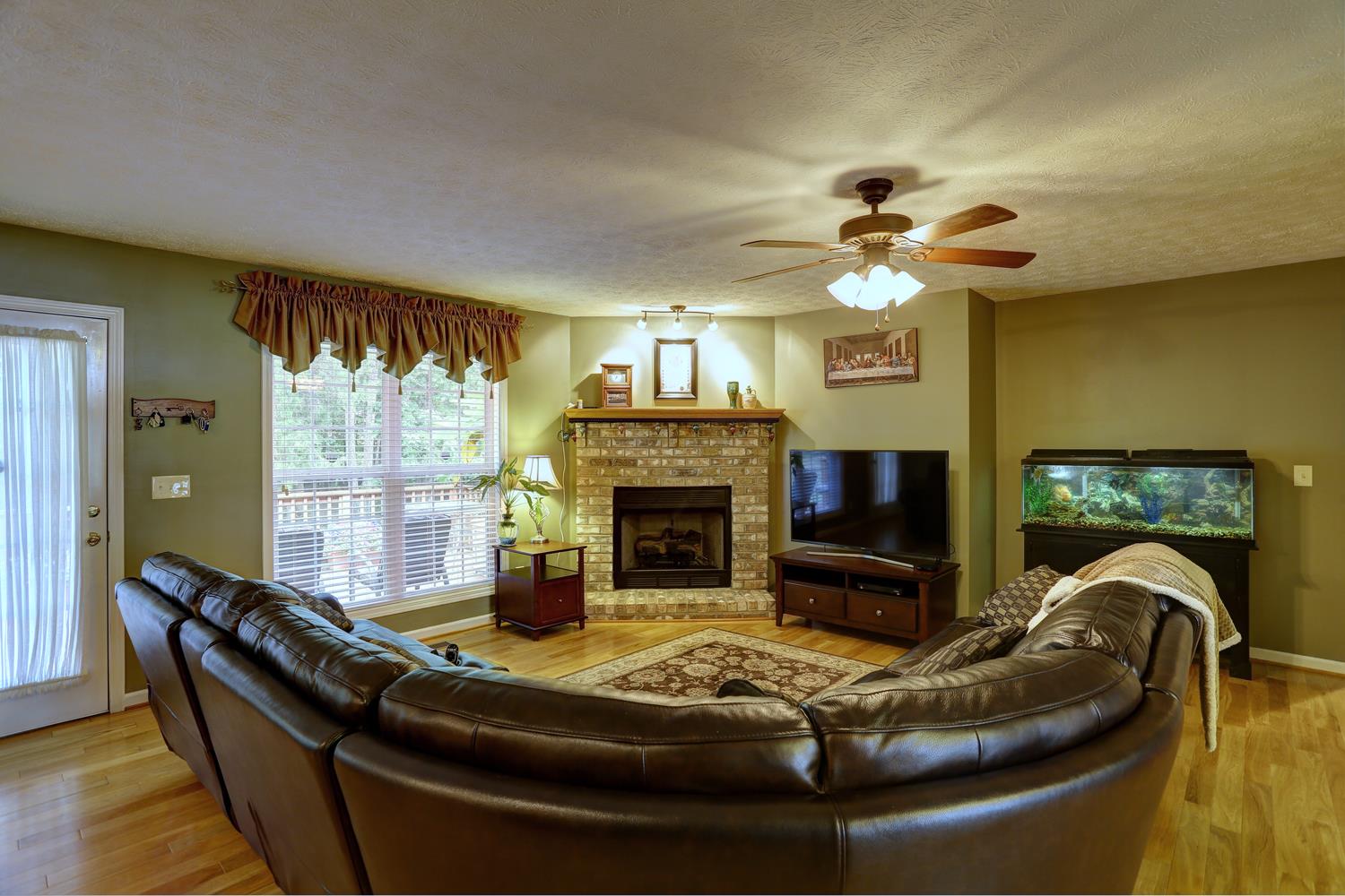 105 Lear Road Portland, TN 37148 - Photo 4 of 25 a living room with furniture and a fireplace