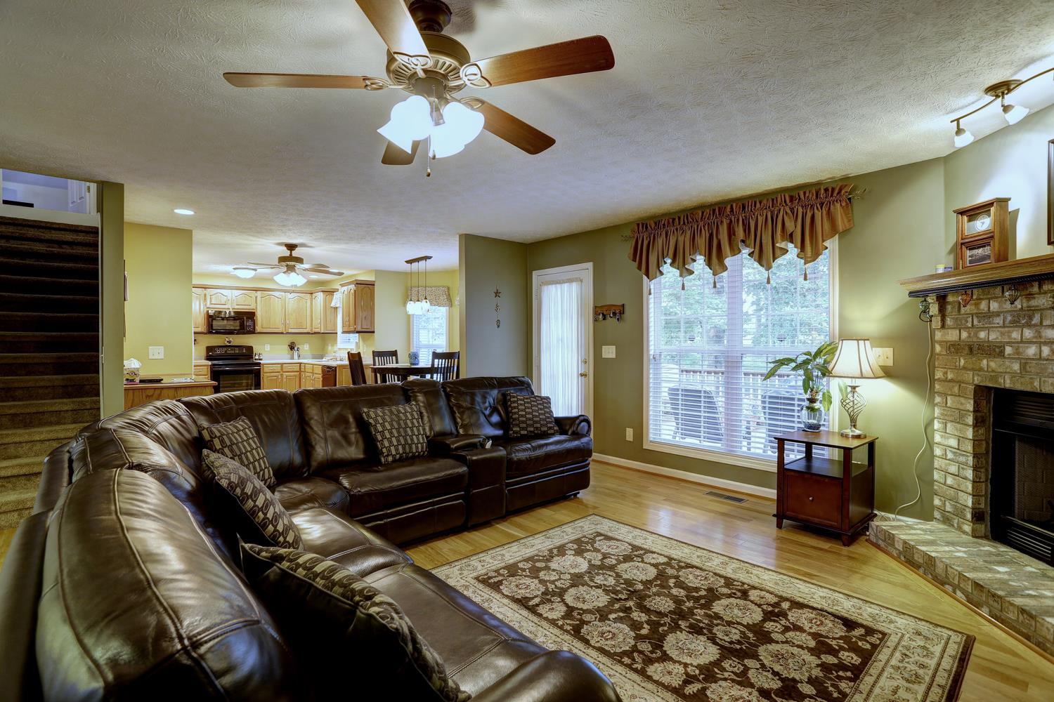 105 Lear Road Portland, TN 37148 - Photo 5 of 25 a living room with furniture and a fireplace