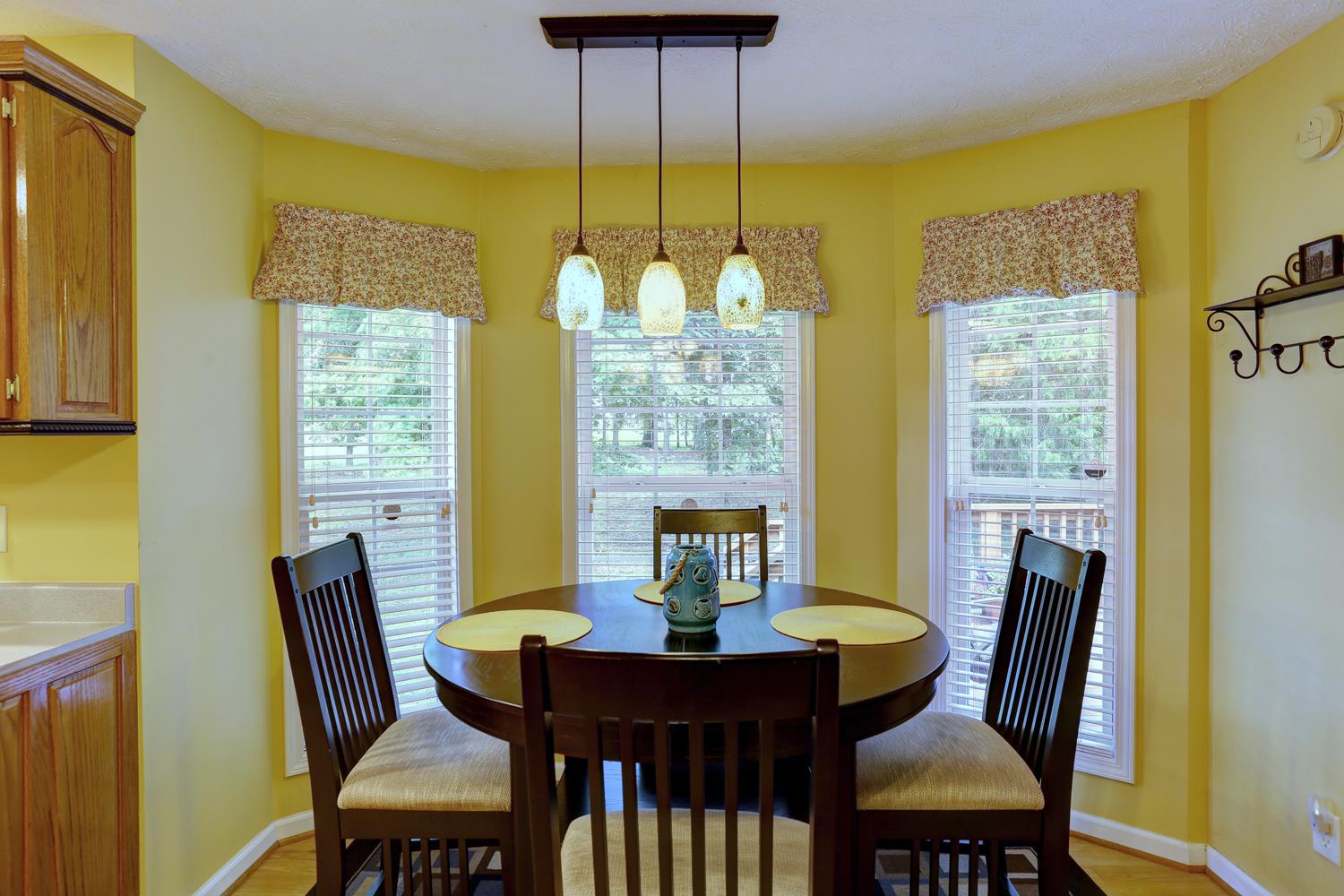 105 Lear Road Portland, TN 37148 - Photo 9 of 25 a view of a dining room with furniture and chandelier