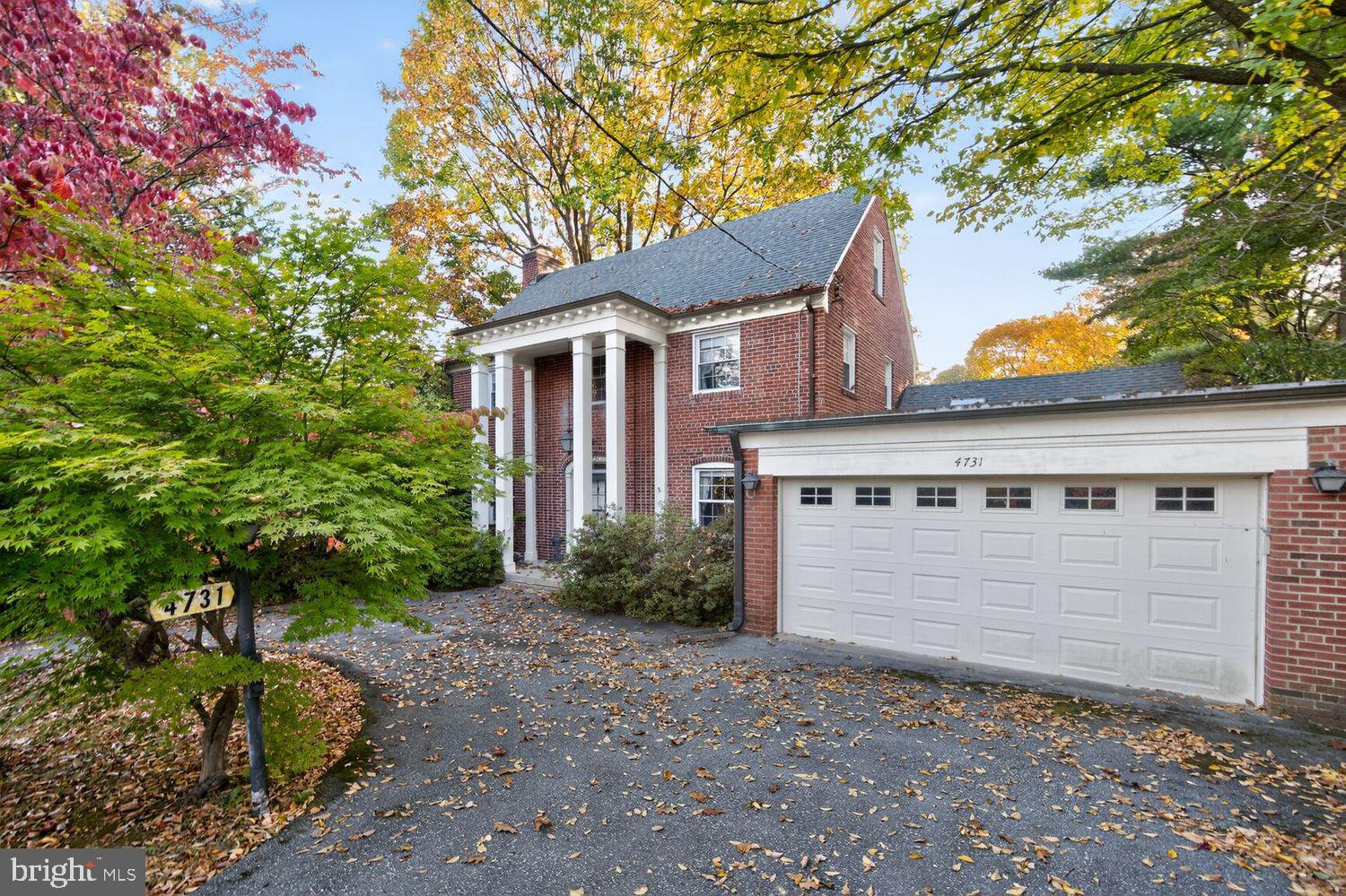 4731 30th Street Northwest Washington, DC 20008 - Photo 2 of 7 a front view of a house with a garden