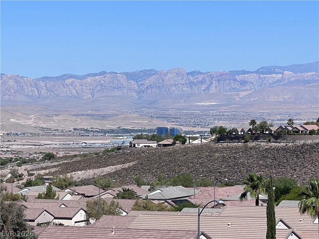 2356 Rue Bienville Way Henderson, NV 89044 - Photo 19 of 20 Distant mountain ranges provide a majestic backdrop to this elevated neighborhood view.