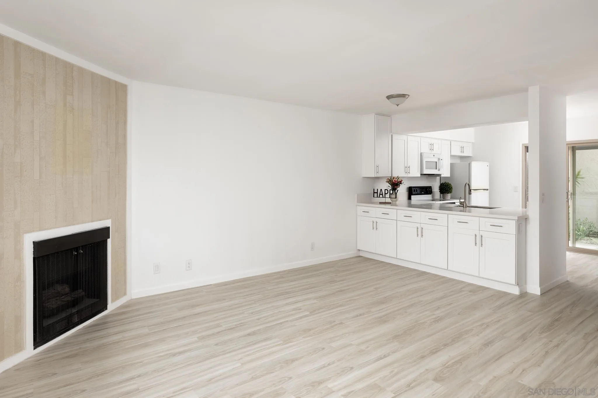 6377 Rancho Mission Road, Unit 4 San Diego, CA 92108 - Photo 2 of 23 a view of a kitchen with electric appliances