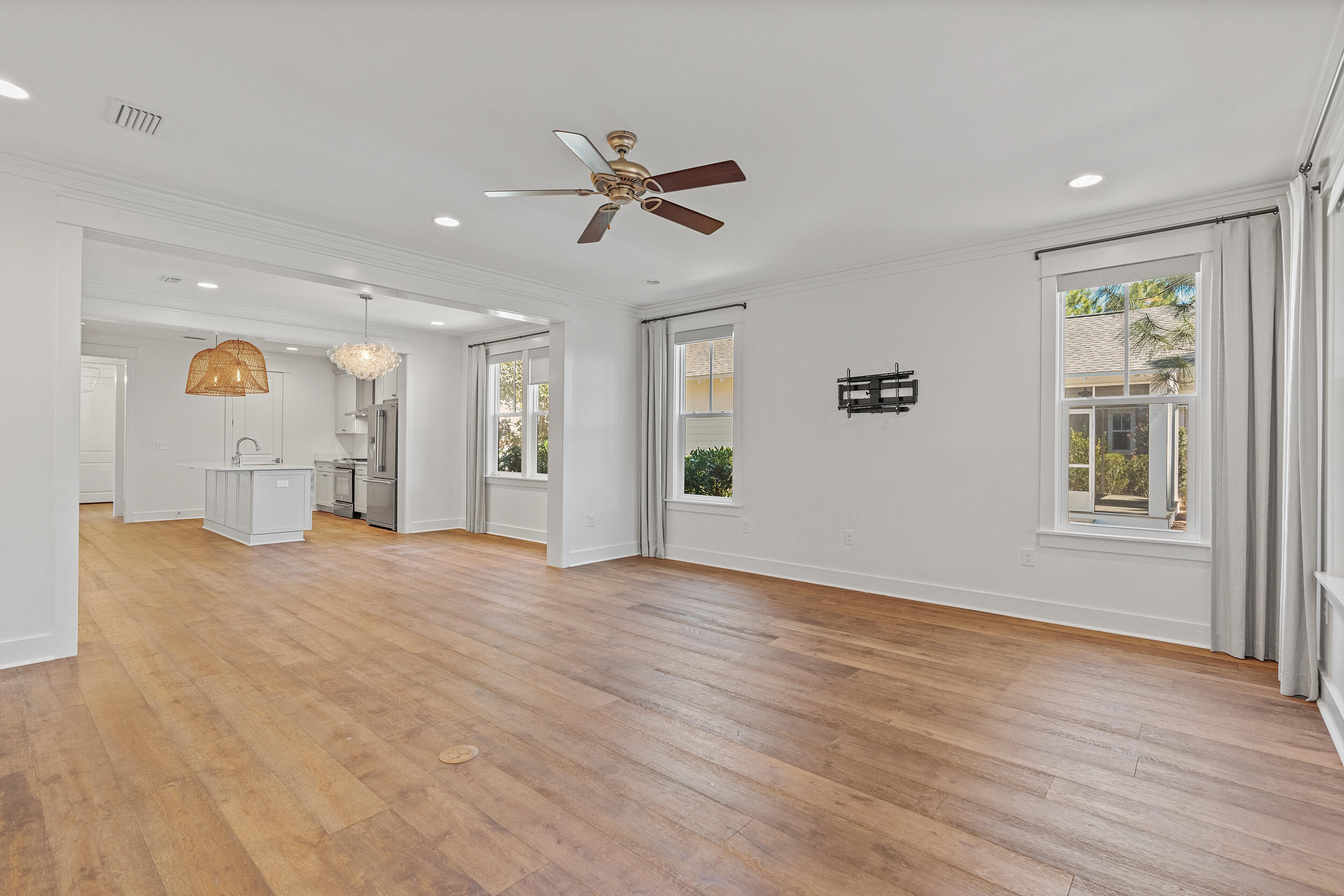 77 Cannonball Lane, Unit LOT (174) Inlet Beach, FL 32461 - Photo 12 of 46 a view of empty room with wooden floor and fan
