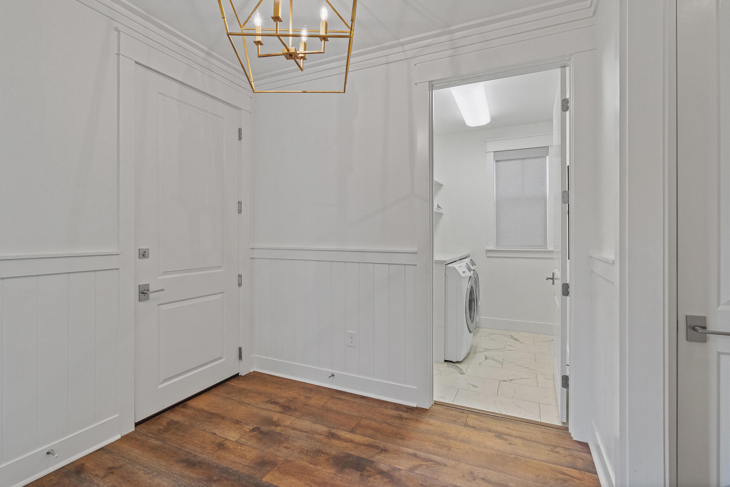 77 Cannonball Lane, Unit LOT (174) Inlet Beach, FL 32461 - Photo 16 of 46 a view of a room with wooden floor and cabinet
