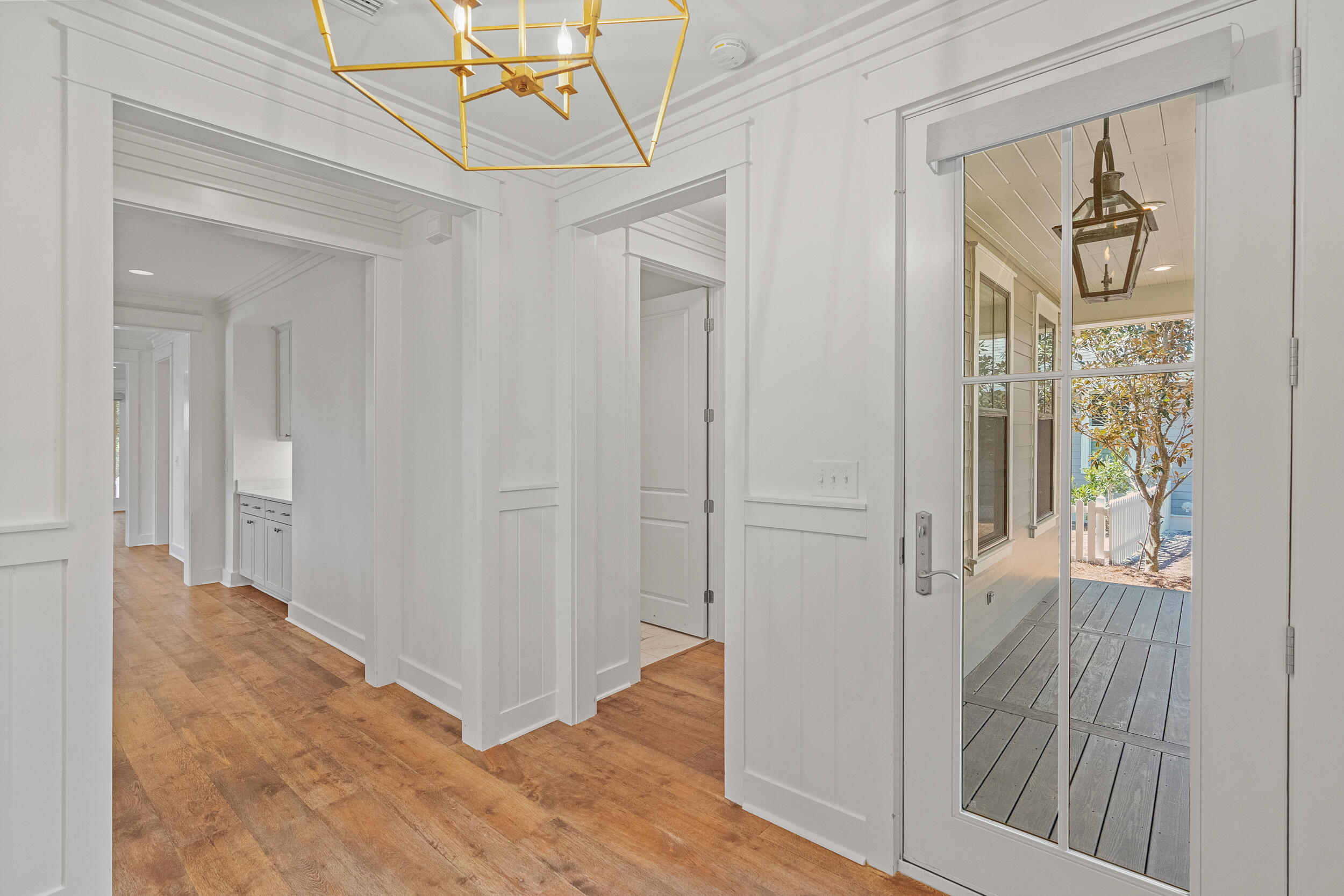 77 Cannonball Lane, Unit LOT (174) Inlet Beach, FL 32461 - Photo 17 of 46 a view of a hallway with wooden floor and closet